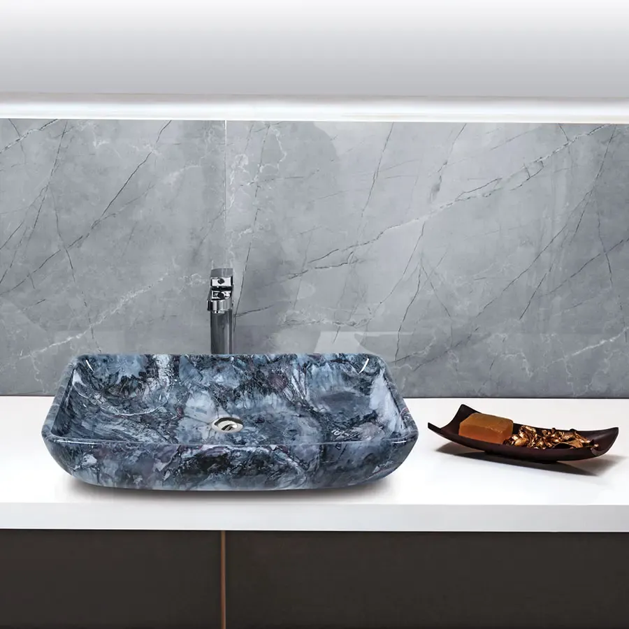 Blue marble-pattern basin on a white counter